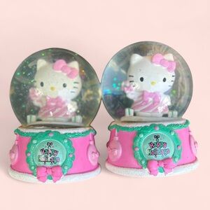 (SOLD) Hello Kitty Pink and Green Holiday Snow Globes